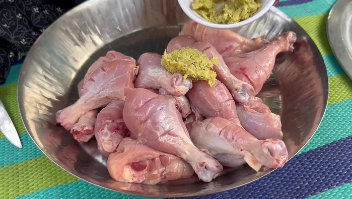 Prepare the spice coating: In a bowl, combine ginger-garlic paste, cornflour, tikka masala, flour, red chili powder, coriander powder, turmeric powder, curd, eggs, cloves, pepper, and salt. Mix well.