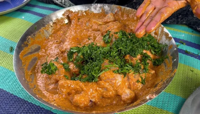 Add crushed green chilies (optional) and lemon juice to the spice mixture. Mix well and marinate the leg pieces for at least one hour.