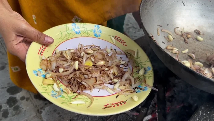 Set aside the fried onion, garlic, and ginger mixture.