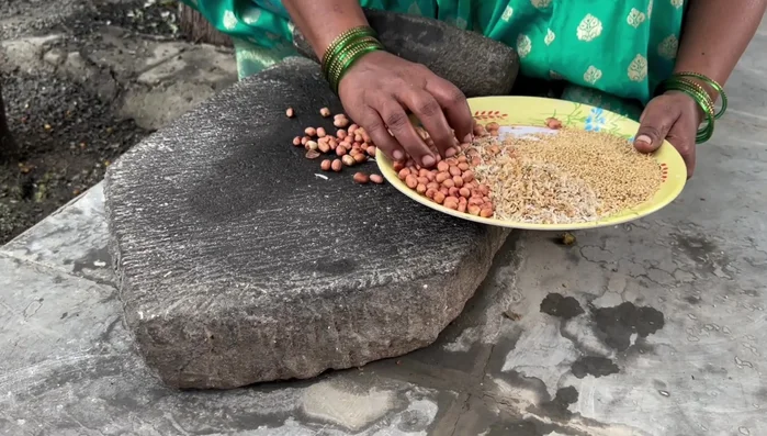 Grind roasted peanuts.