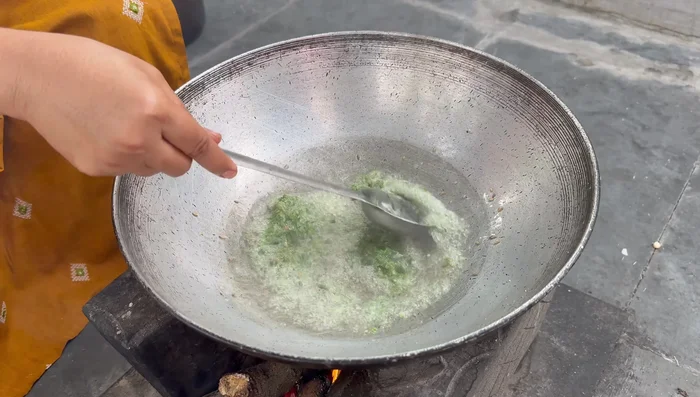 Fry the paste for 2-3 minutes until the rawness is gone.