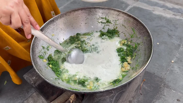 Add water to adjust consistency, add salt to taste, and simmer for 2-3 minutes.