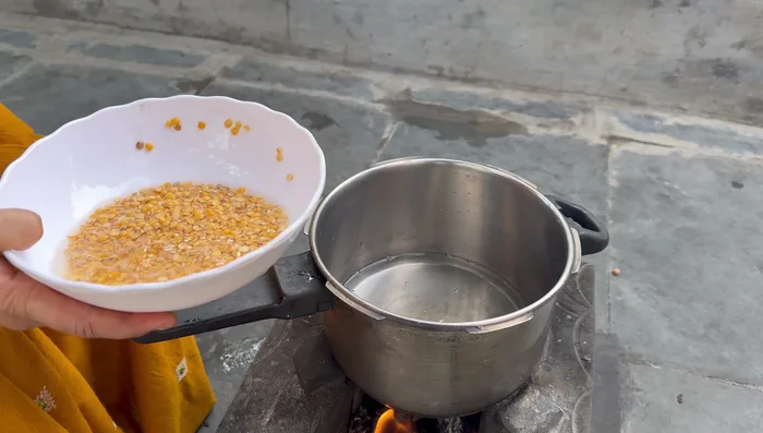 Cook Tur dal in a cooker with one whistle.