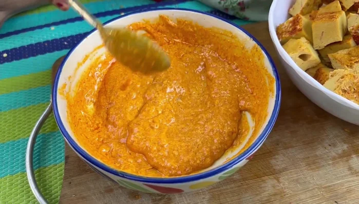 Coat each tikki piece with the masala mixture.
