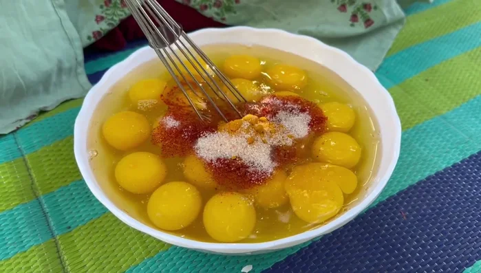 Mix the eggs well until bubbles appear on the top, indicating a well-combined mixture.