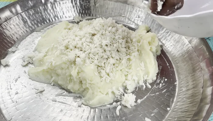 Mix mashed potatoes with poha, ginger-garlic paste, coriander powder, garam masala, chaat masala, red chili powder, turmeric powder, and salt.