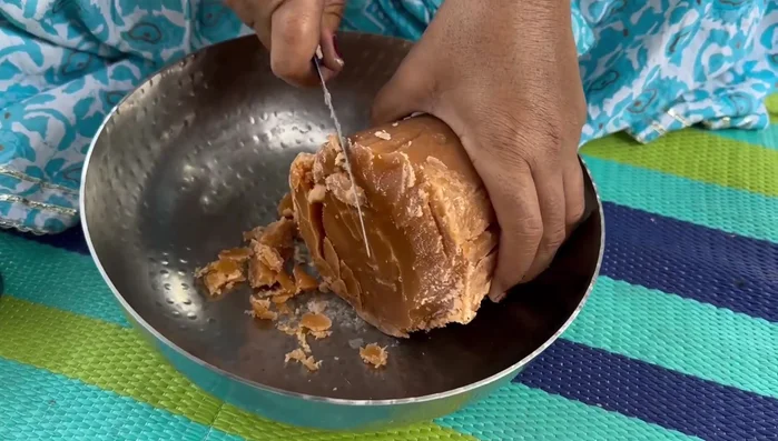 Finely chop the jaggery. The amount depends on your preference for sweetness.