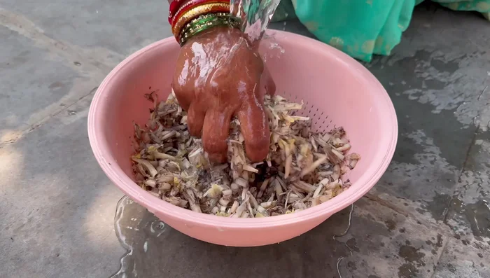 Wash the chopped banana flowers thoroughly to remove any sticky residue.