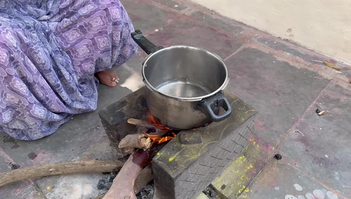 Cook the soaked dals in a cooker with water until they are soft.