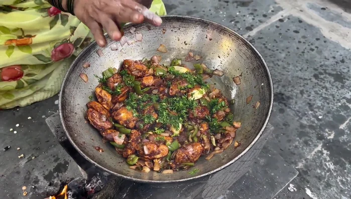 Garnish with coriander and serve hot.
