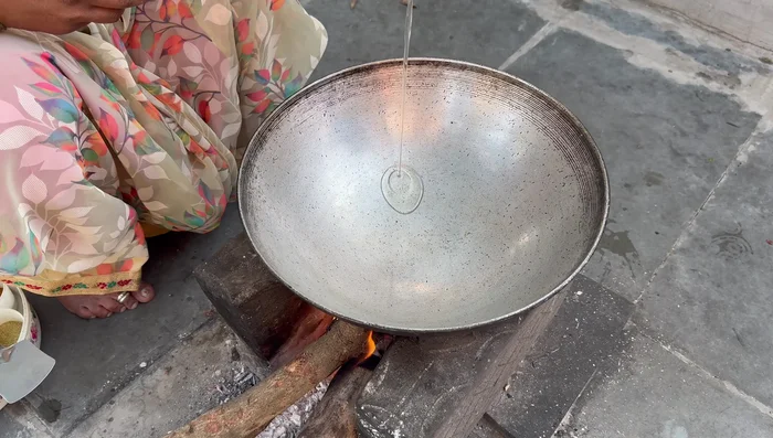 Heat oil in a pan, add mustard seeds, cumin seeds, and curry leaves. Sauté until fragrant.