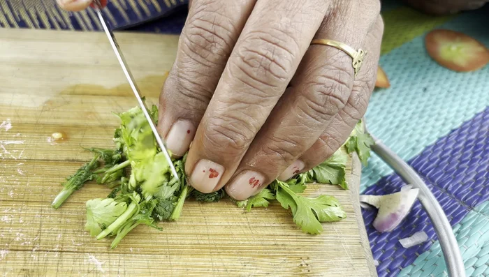 Finely chop the coriander.