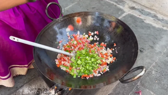 Add the beans and tomatoes. Fry until the vegetables are cooked but not mushy.