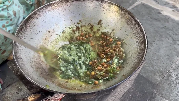 Add the mashed Gilkyach to the pan and mix well. Add salt to taste.