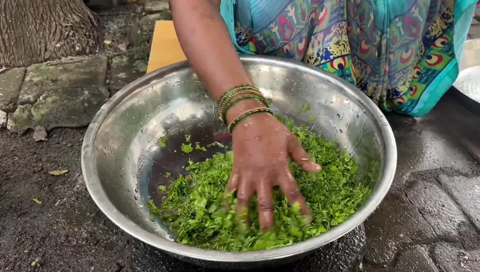 Mix gram flour, coriander paste, green garlic-chilli paste, cumin seeds, asafoetida, and sweetener. Add water to adjust consistency.