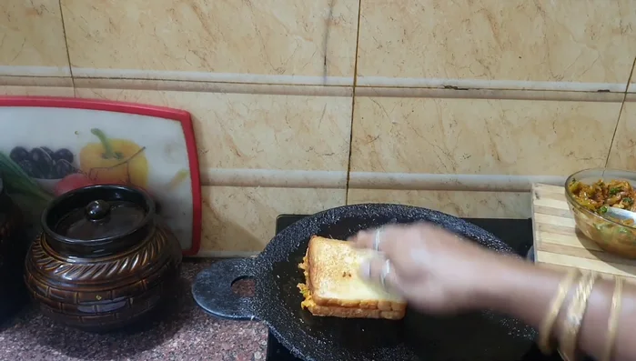Top with the other slice of bread.