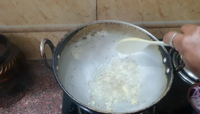 Add chopped onion and bell pepper. Saute until softened.