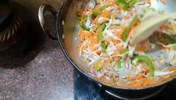 Cook the vegetables until tender. Add tomato sauce and soy sauce. Stir in coriander leaves.