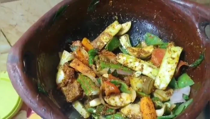 Add tamarind water to the mixture.