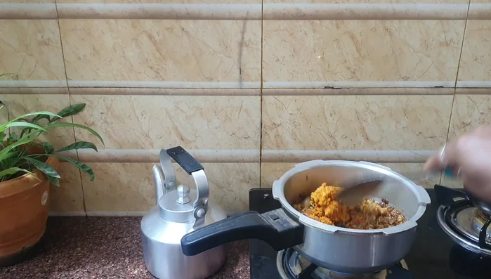 Boil the lentils and spice paste together.