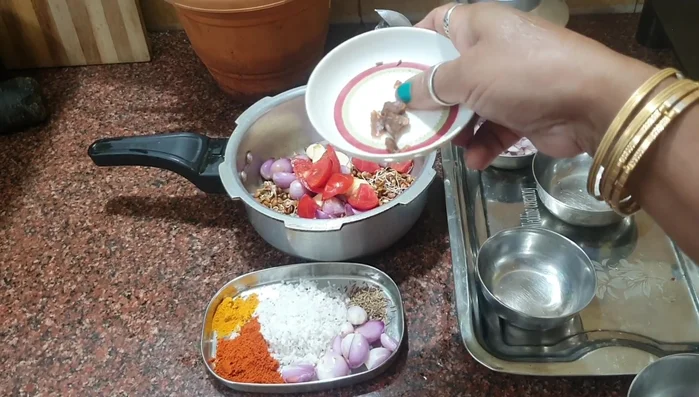 Add grated bitter gourd.