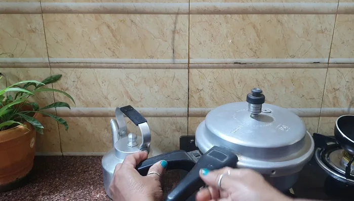 Check if the lentils are cooked. If not, grind them.