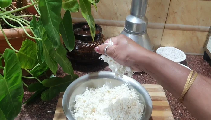 Knead the grated tapioca well with your hands. It will be sticky.