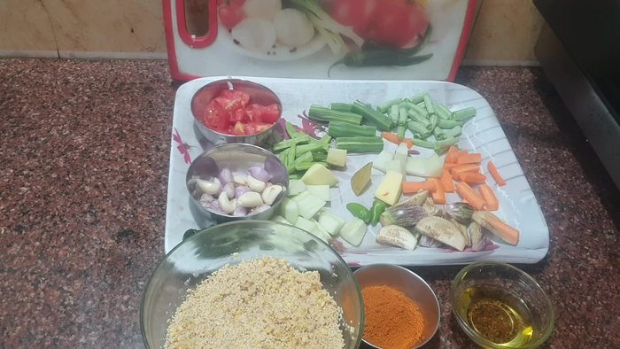 Prepare the sambar separately. (Refer to your preferred sambar recipe and adjust timing accordingly. No specifics on sambar preparation were provided in the transcript).