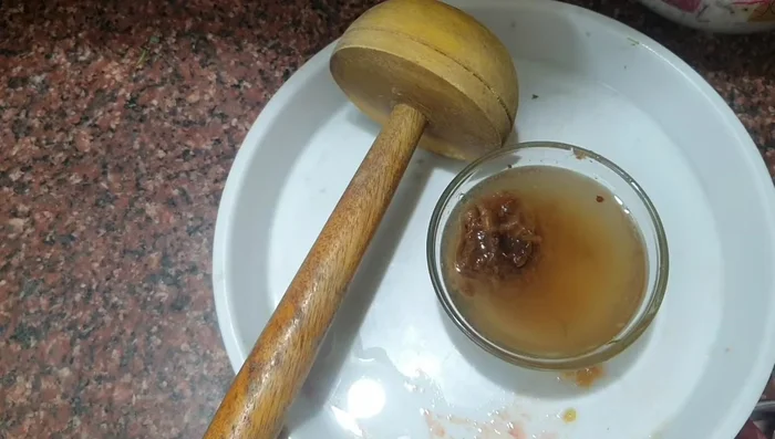 Boil the tamarind in a small amount of water until softened.