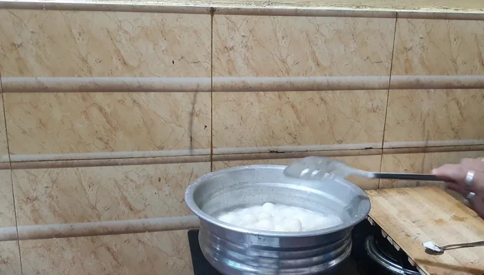 Remove the cooked dumplings from water. For the milk kozhukatta, follow the same steps as pure kozhukatta.