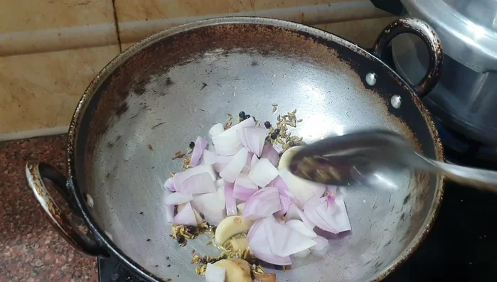 Add chopped onion and fry until translucent (90.24).