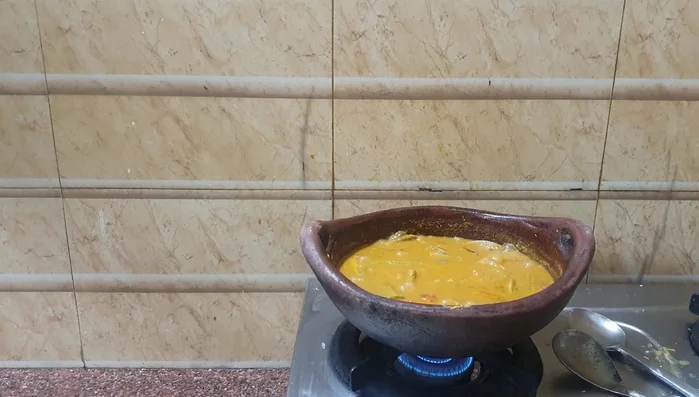 Simmer for a few minutes until the curry thickens.