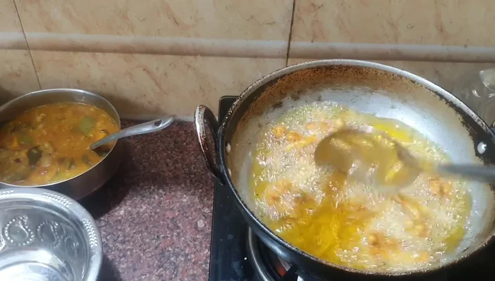 Once cooked, remove the Cauliflower 65 from the pan.