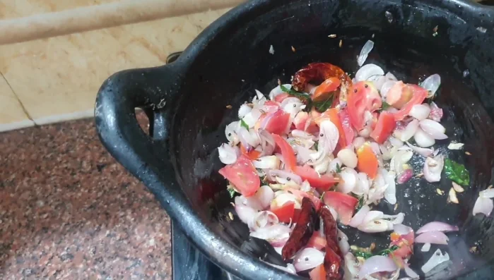 Add the tomatoes, salt, and cook until slightly fried.