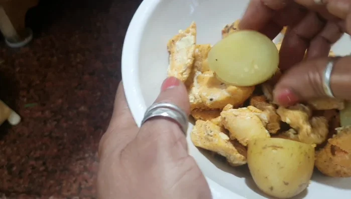 Mash the cooked chicken and potatoes. Grind them in a mixer to a smooth paste.