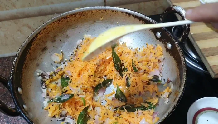 Add grated cabbage. Stir well and cover the pan.