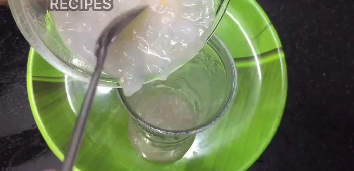 Pour the Nungu Paal Sarbath into glasses.