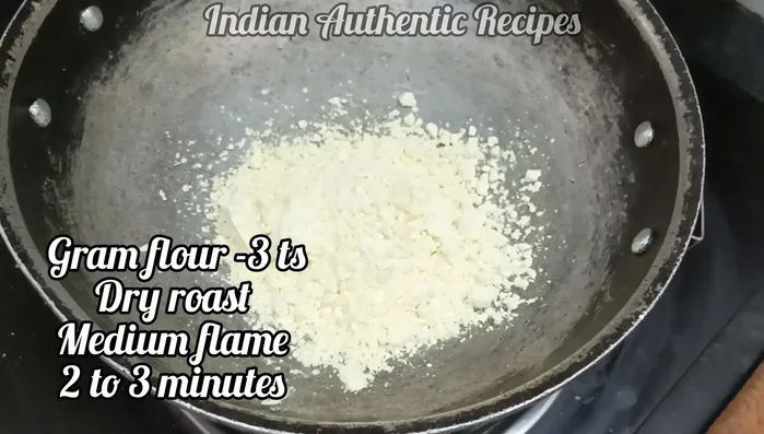 Heat groundnut oil in a pan. Add groundnut flour and fry for 2-3 minutes until fragrant.