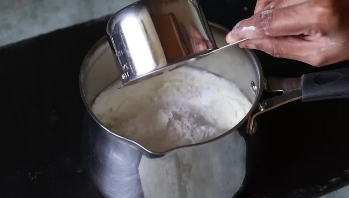 Add fat, flour, and powder.
