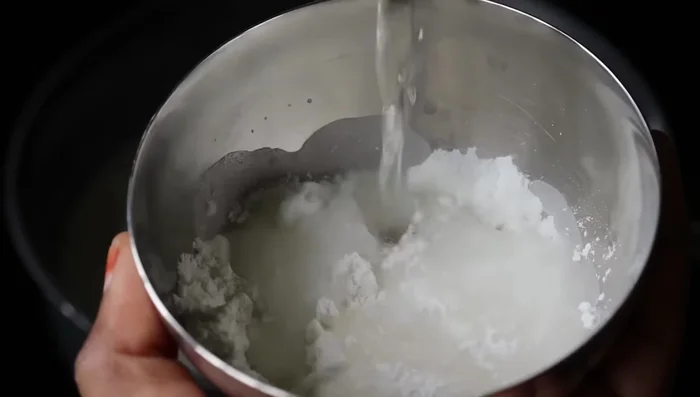 In a separate bowl, mix 1 ½ tablespoons rice flour with ¼ cup water until smooth. Add to the boiling milk mixture to prevent curdling. (1173.44)