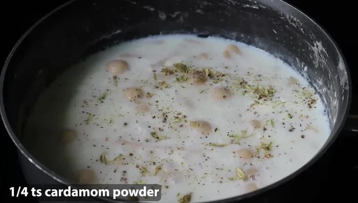 Add ½ cup sugar (or jaggery), and ¼ teaspoon cardamom powder. Stir until thickened. (1206)