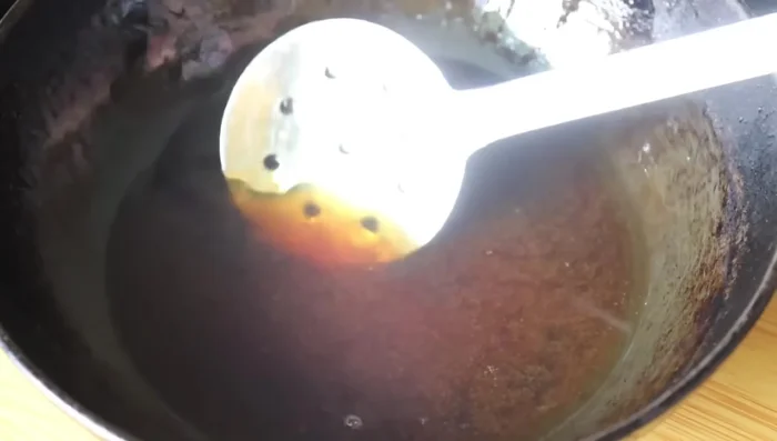 In a pan, dissolve 1 cup jaggery in ½ cup water. (574.16)