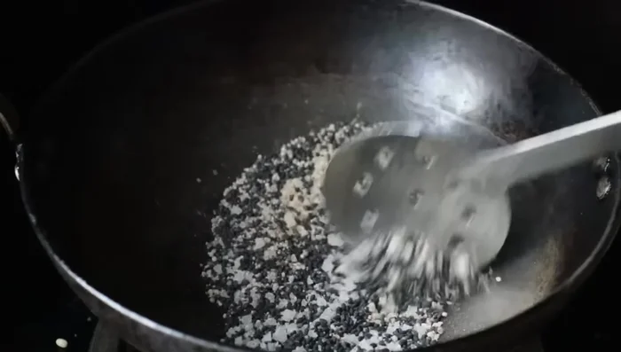 Add salt to taste and fry briefly.