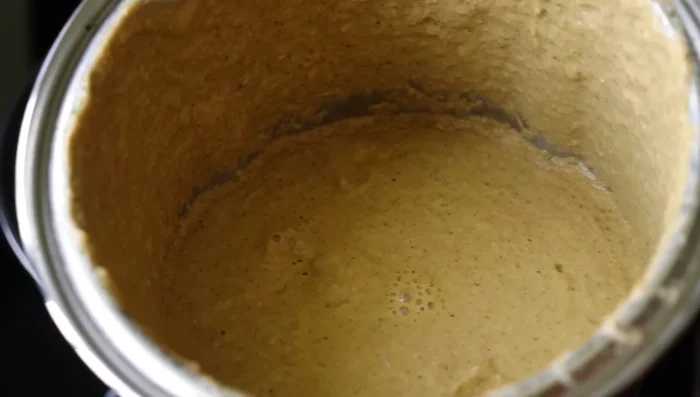 Add the spices (turmeric, chili powder, coriander powder, etc.) and salt.