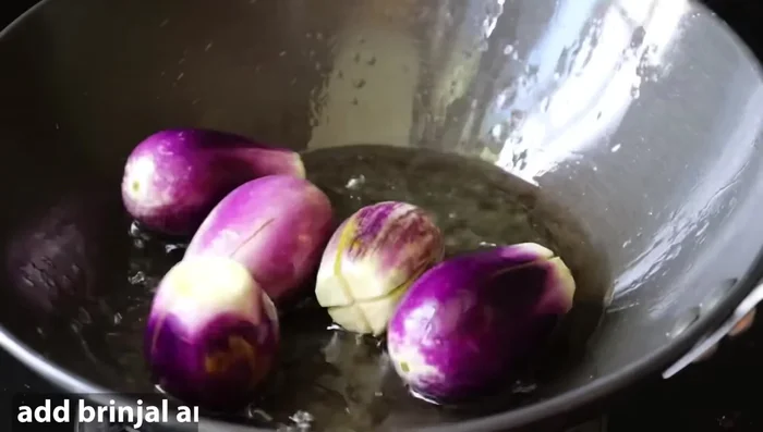 Add the chopped brinjal and mix well.