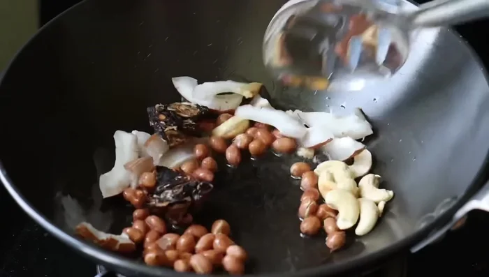 Heat oil in a pot.