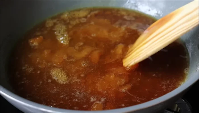 Shape the dough into small balls and flatten them slightly.