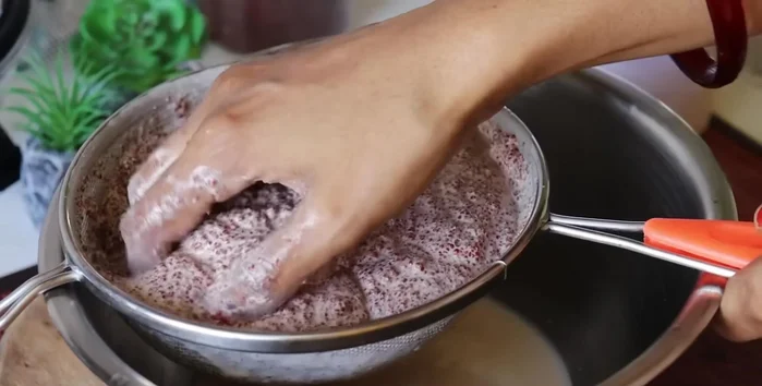 Grind the remaining ragi pulp with a little water. The first extraction will be the thickest milk.