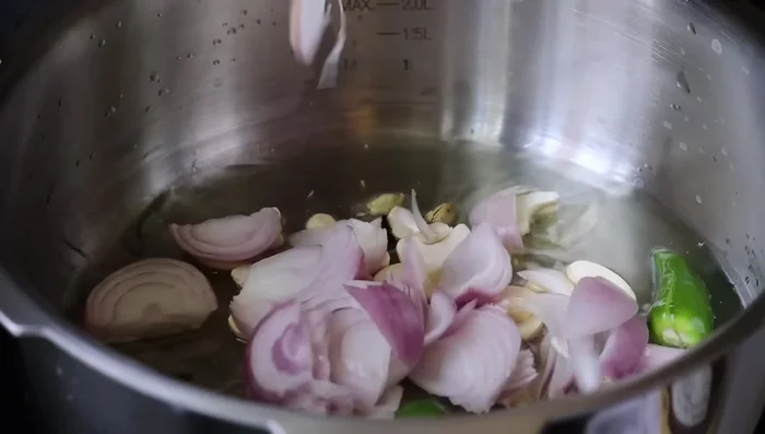 Pour in the prepared coconut milk. (Details missing in transcript)