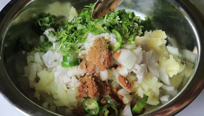 Prepare the Pani Puri mixture. Add 8 teaspoons of Chaat Masala.